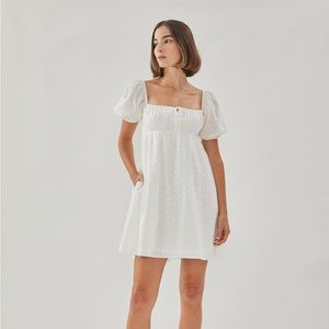 Tie-front white mini dress in embroidered cotton